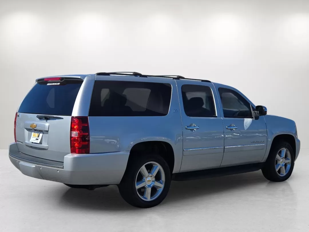 2013 /Light Titanium/Dark Titanium Chevrolet Suburban LTZ (1GNSCKE02DR) with an Other engine, located at 3959 U.S. 80 W, Phenix City, AL, 36870, (334) 297-4885, 32.469296, -85.135185 - Step into a world of adventure and family bonding with this 2013 Chevrolet Suburban LTZ, available now at Gils Auto in Phenix City, AL. Ideal for growing families or anyone who loves the open road, this spacious SUV combines luxury, comfort, and versatility for those seeking a reliable vehicle for e - Photo#6
