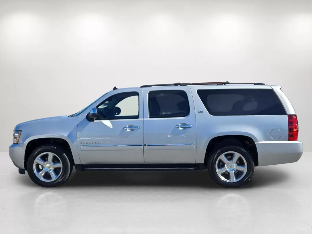 2013 /Light Titanium/Dark Titanium Chevrolet Suburban LTZ (1GNSCKE02DR) with an Other engine, located at 3959 U.S. 80 W, Phenix City, AL, 36870, (334) 297-4885, 32.469296, -85.135185 - Step into a world of adventure and family bonding with this 2013 Chevrolet Suburban LTZ, available now at Gils Auto in Phenix City, AL. Ideal for growing families or anyone who loves the open road, this spacious SUV combines luxury, comfort, and versatility for those seeking a reliable vehicle for e - Photo#9