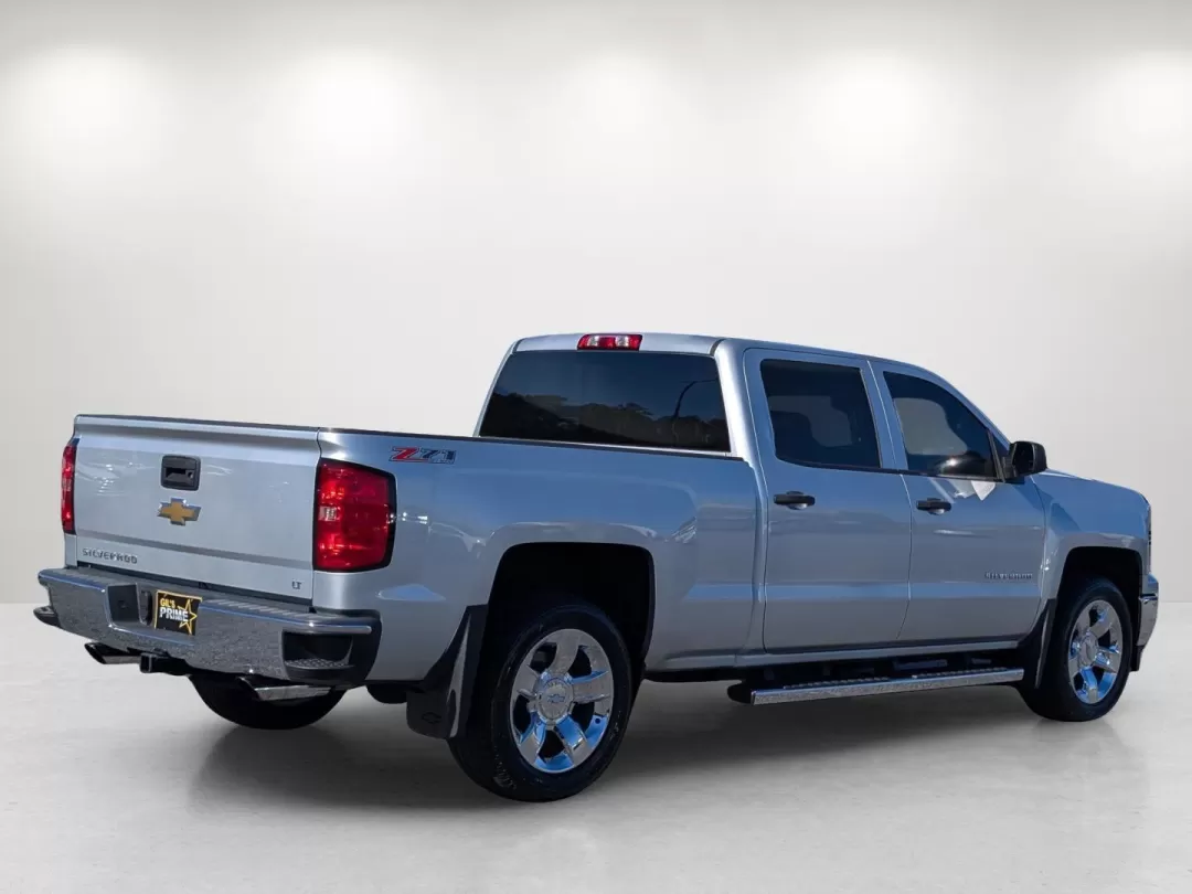 2014 /Jet Black Chevrolet Silverado 1500 LT (3GCUKRECXEG) with an Other engine, located at 1430 Gateway Drive, Opelika, AL, 36801, (334) 239-0944, 32.637871, -85.409790 - Are you ready to elevate your adventures with a reliable and versatile truck? Look no further than this impressive 2014 Chevrolet Silverado 1500 LT, available now at Gils Auto in Phenix City, AL! Whether you're a growing family looking for a spacious ride, a weekend warrior ready for off-road excurs - Photo#4