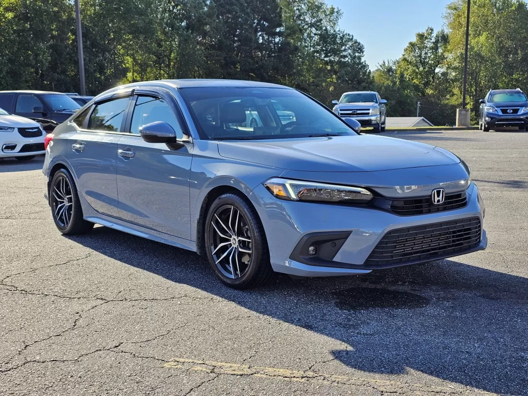 2023 Honda Civic Sedan Touring (2HGFE1F91PH) with an Other engine, located at 3959 U.S. 80 W, Phenix City, AL, 36870, (334) 297-4885, 32.469296, -85.135185 - **Experience the Perfect Blend of Style and Comfort with the 2023 Honda Civic Touring Sedan Ideal for Your Daily Commute and Weekend Adventures!**<br /> <br /> Looking for a reliable, stylish vehicle that fits your lifestyle? The 2023 Honda Civic Touring Sedan is just what you need. With its turboc - Photo#2