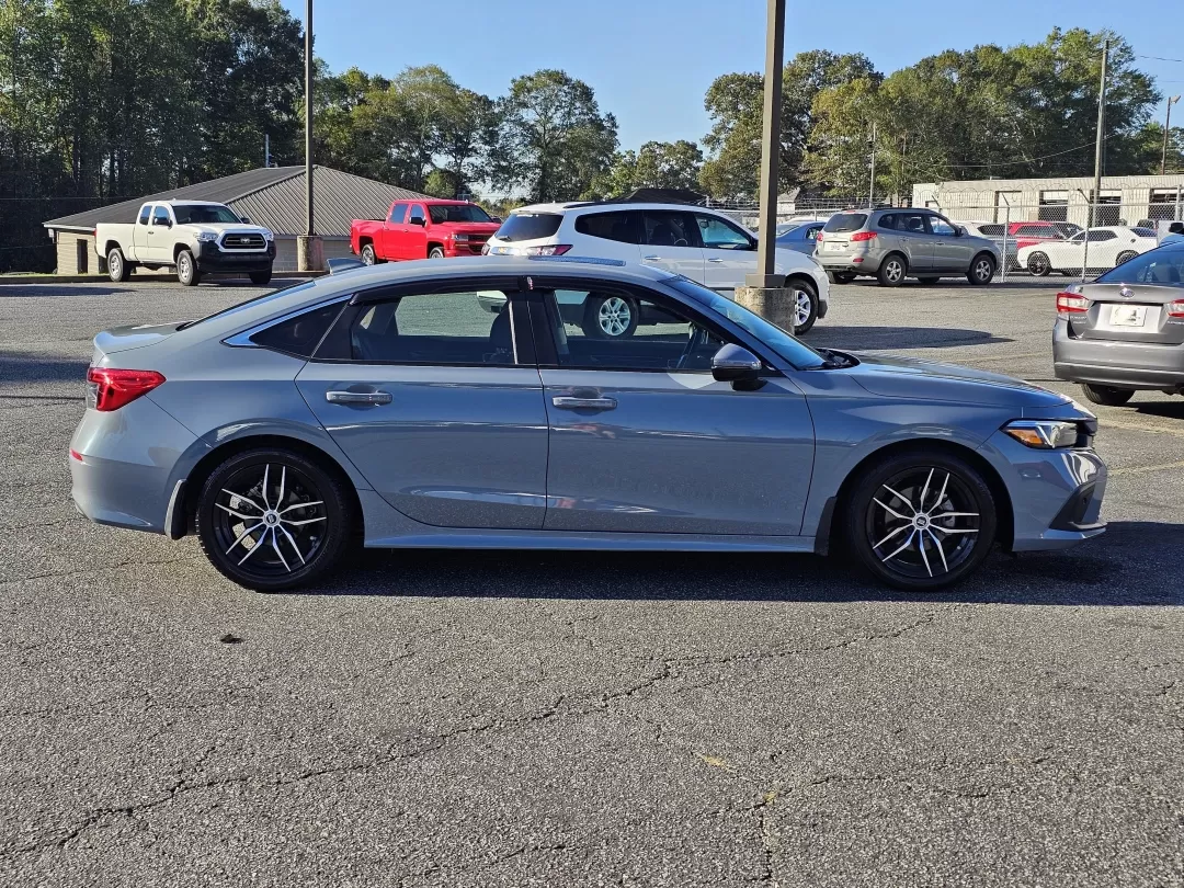 2023 Honda Civic Sedan Touring (2HGFE1F91PH) with an Other engine, located at 3959 U.S. 80 W, Phenix City, AL, 36870, (334) 297-4885, 32.469296, -85.135185 - **Experience the Perfect Blend of Style and Comfort with the 2023 Honda Civic Touring Sedan Ideal for Your Daily Commute and Weekend Adventures!**<br /> <br /> Looking for a reliable, stylish vehicle that fits your lifestyle? The 2023 Honda Civic Touring Sedan is just what you need. With its turboc - Photo#3