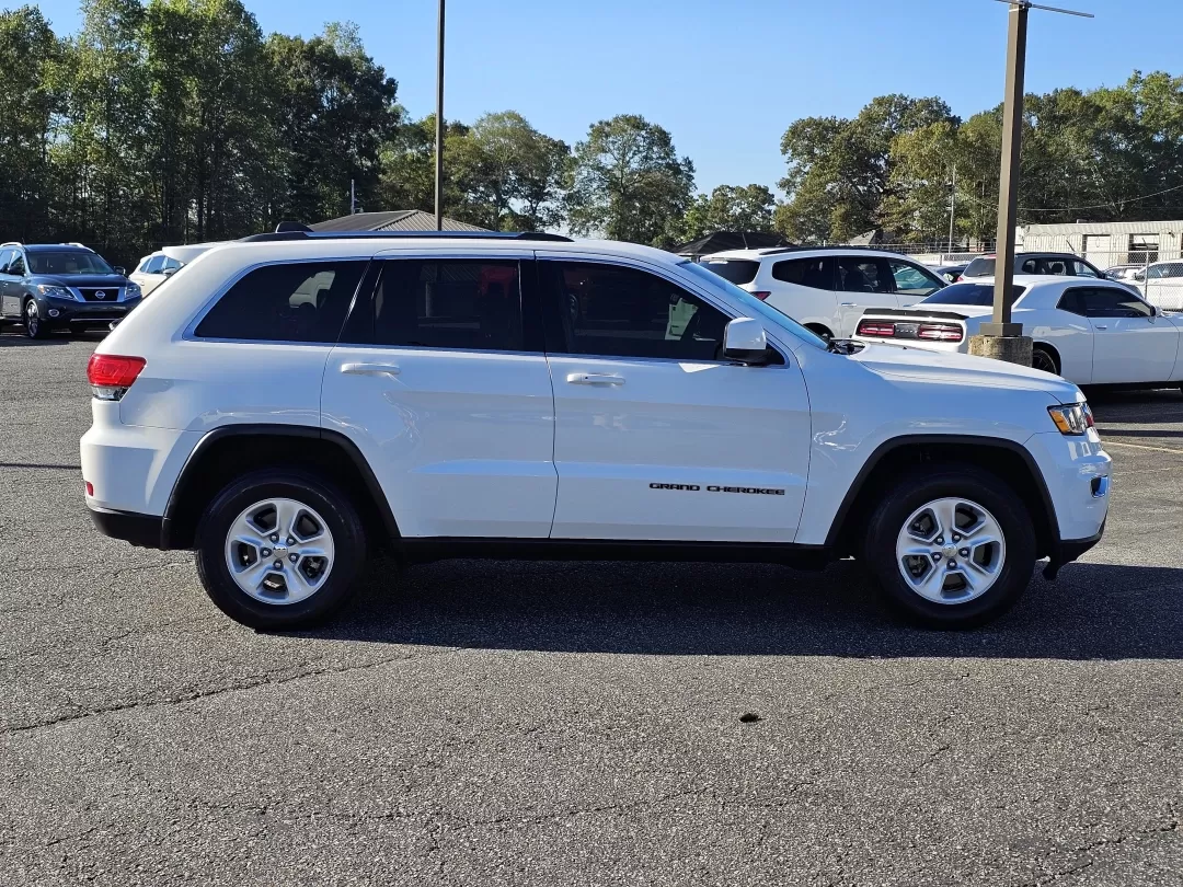 2017 /Lt Frost Beige/Black Jeep Grand Cherokee Laredo (1C4RJEAG3HC) with an Other engine, located at 3959 U.S. 80 W, Phenix City, AL, 36870, (334) 297-4885, 32.469296, -85.135185 - Looking for an SUV that combines versatility, style, and reliability for your family adventures or daily commutes? Look no further than the 2017 Jeep Grand Cherokee Laredo, now available at Gils Auto in Phenix City, AL. This robust vehicle is perfect for growing families, weekend explorers, or anyon - Photo#3