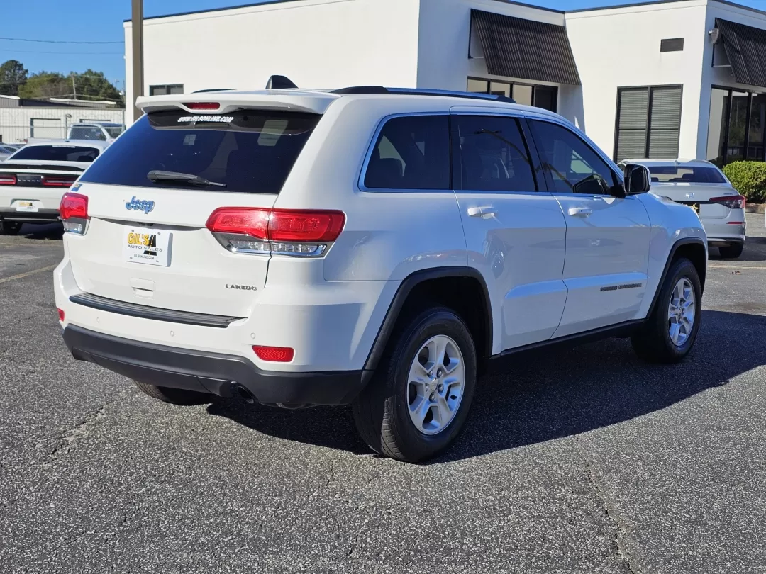 2017 /Lt Frost Beige/Black Jeep Grand Cherokee Laredo (1C4RJEAG3HC) with an Other engine, located at 3959 U.S. 80 W, Phenix City, AL, 36870, (334) 297-4885, 32.469296, -85.135185 - Looking for an SUV that combines versatility, style, and reliability for your family adventures or daily commutes? Look no further than the 2017 Jeep Grand Cherokee Laredo, now available at Gils Auto in Phenix City, AL. This robust vehicle is perfect for growing families, weekend explorers, or anyon - Photo#4
