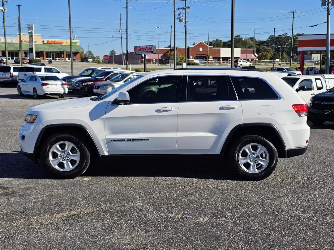 2017 /Lt Frost Beige/Black Jeep Grand Cherokee Laredo (1C4RJEAG3HC) with an Other engine, located at 3959 U.S. 80 W, Phenix City, AL, 36870, (334) 297-4885, 32.469296, -85.135185 - Looking for an SUV that combines versatility, style, and reliability for your family adventures or daily commutes? Look no further than the 2017 Jeep Grand Cherokee Laredo, now available at Gils Auto in Phenix City, AL. This robust vehicle is perfect for growing families, weekend explorers, or anyon - Photo#7
