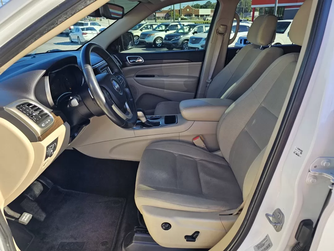 2017 /Lt Frost Beige/Black Jeep Grand Cherokee Laredo (1C4RJEAG3HC) with an Other engine, located at 3959 U.S. 80 W, Phenix City, AL, 36870, (334) 297-4885, 32.469296, -85.135185 - Looking for an SUV that combines versatility, style, and reliability for your family adventures or daily commutes? Look no further than the 2017 Jeep Grand Cherokee Laredo, now available at Gils Auto in Phenix City, AL. This robust vehicle is perfect for growing families, weekend explorers, or anyon - Photo#9