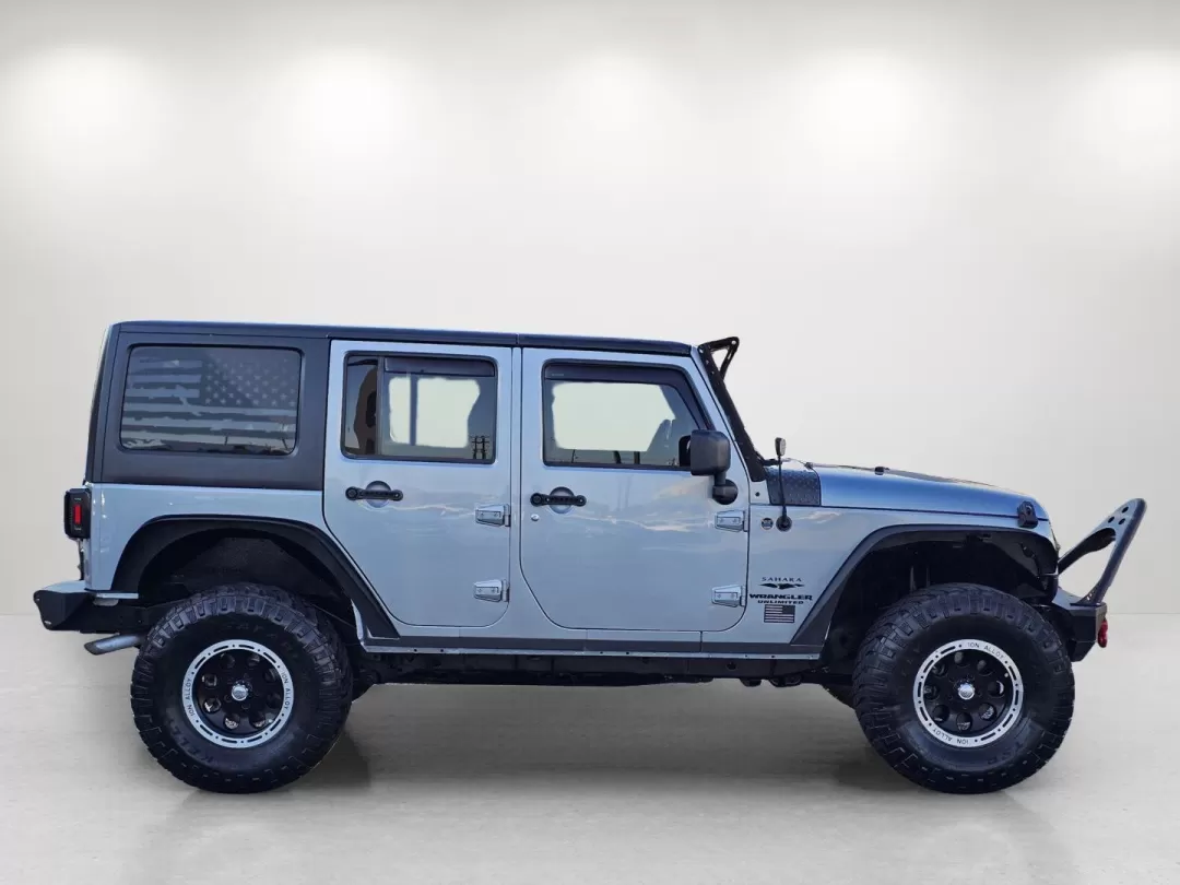 2014 /Black Jeep Wrangler Sahara (1C4BJWEG2EL) with an Other engine, located at 3959 U.S. 80 W, Phenix City, AL, 36870, (334) 297-4885, 32.469296, -85.135185 - **Adventure Awaits: Explore the Great Outdoors with This 2014 Jeep Wrangler Sahara at Gils Auto!**<br /> <br /> Are you ready to take on the open road and make lasting memories with friends and family? This rugged 2014 Jeep Wrangler Sahara, available at Gils Auto in Phenix City, AL, is the perfect c - Photo#4