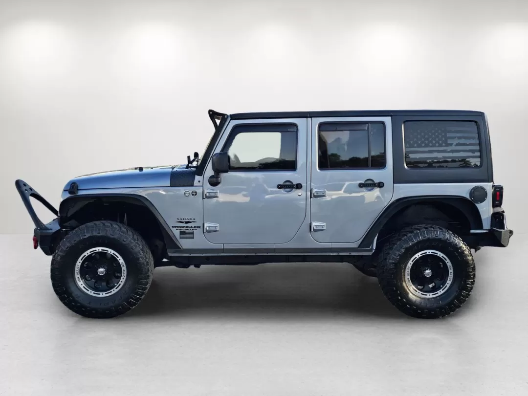 2014 /Black Jeep Wrangler Sahara (1C4BJWEG2EL) with an Other engine, located at 3959 U.S. 80 W, Phenix City, AL, 36870, (334) 297-4885, 32.469296, -85.135185 - **Adventure Awaits: Explore the Great Outdoors with This 2014 Jeep Wrangler Sahara at Gils Auto!**<br /> <br /> Are you ready to take on the open road and make lasting memories with friends and family? This rugged 2014 Jeep Wrangler Sahara, available at Gils Auto in Phenix City, AL, is the perfect c - Photo#8