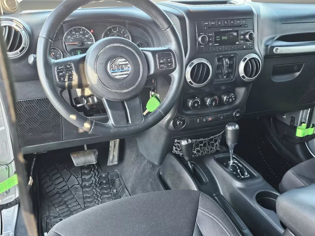 2014 /Black Jeep Wrangler Sahara (1C4BJWEG2EL) with an Other engine, located at 3959 U.S. 80 W, Phenix City, AL, 36870, (334) 297-4885, 32.469296, -85.135185 - **Adventure Awaits: Explore the Great Outdoors with This 2014 Jeep Wrangler Sahara at Gils Auto!**<br /> <br /> Are you ready to take on the open road and make lasting memories with friends and family? This rugged 2014 Jeep Wrangler Sahara, available at Gils Auto in Phenix City, AL, is the perfect c - Photo#16
