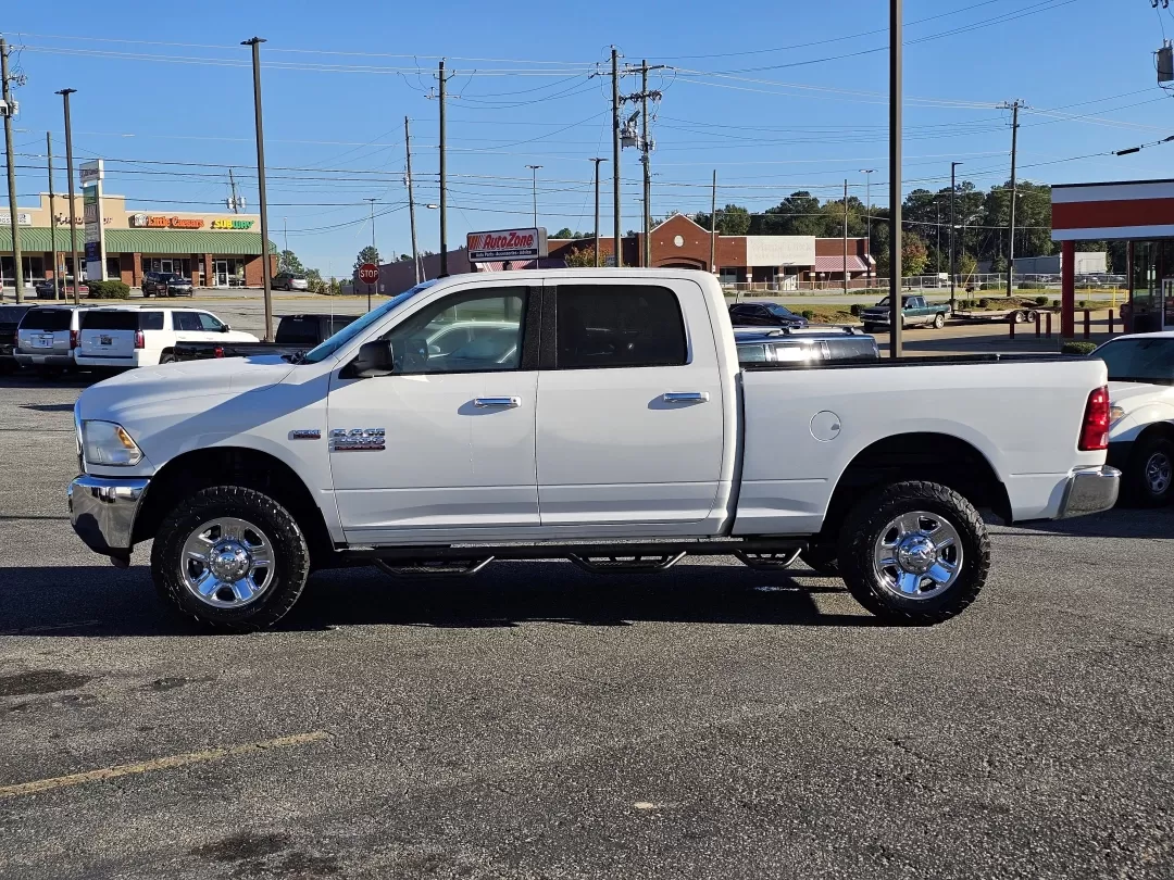 2016 /Diesel Gray/Black Ram 2500 SLT (3C6TR5DT2GG) with an Other engine, located at 3959 U.S. 80 W, Phenix City, AL, 36870, (334) 297-4885, 32.469296, -85.135185 - **Discover Your Next Adventure with the 2016 Ram 2500 SLT at Gils Auto!**<br /> <br /> Whether you're hauling heavy loads, embarking on weekend adventures, or navigating daily commutes, the 2016 Ram 2500 SLT is the versatile pickup truck you need. With its robust build and impressive features, this - Photo#7