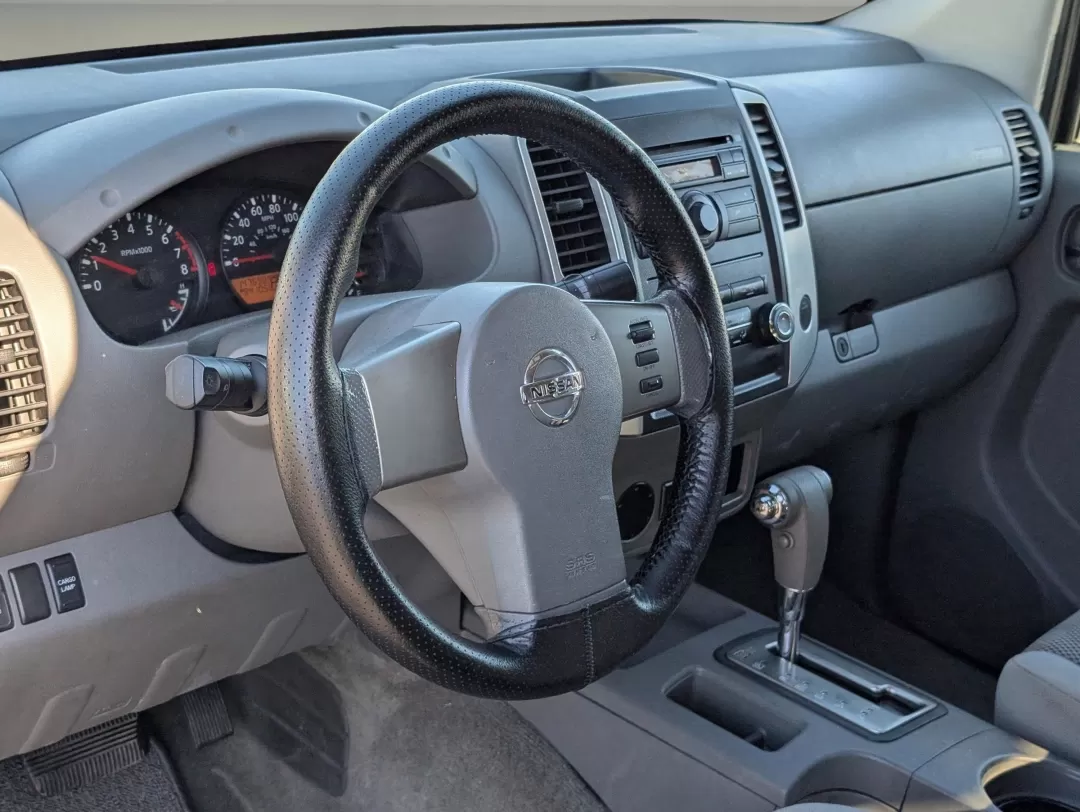 2010 /Steel Nissan Frontier SE (1N6AD0FR2AC) with an Other engine, located at 3959 U.S. 80 W, Phenix City, AL, 36870, (334) 297-4885, 32.469296, -85.135185 - **Discover Adventure with the 2010 Nissan Frontier SE at Gils Auto - Phenix City!**<br /> <br /> Are you ready to embrace the thrill of weekend adventures or tackle everyday tasks with ease? Whether you're hauling gear for a family camping trip or navigating city streets, the 2010 Nissan Frontier SE - Photo#10