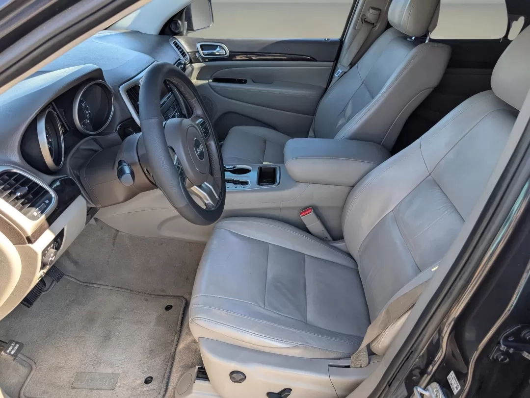 2012 /Dark Graystone/Medium Graystone Jeep Grand Cherokee Laredo Altitude (1C4RJEAG0CC) with an Other engine, located at 804 22nd Ave, Phenix City, AL, 36870, (334) 297-1860, 32.484749, -85.024475 - **Unleash Your Adventurous Spirit with the 2012 Jeep Grand Cherokee Laredo Altitude!**<br /> <br /> Are you looking for the perfect vehicle to elevate your lifestyle? Whether it's weekend getaways, daily commutes, or family road trips, the 2012 Jeep Grand Cherokee Laredo Altitude is designed to meet - Photo#11