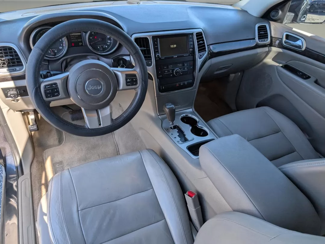 2012 /Dark Graystone/Medium Graystone Jeep Grand Cherokee Laredo Altitude (1C4RJEAG0CC) with an Other engine, located at 804 22nd Ave, Phenix City, AL, 36870, (334) 297-1860, 32.484749, -85.024475 - **Unleash Your Adventurous Spirit with the 2012 Jeep Grand Cherokee Laredo Altitude!**<br /> <br /> Are you looking for the perfect vehicle to elevate your lifestyle? Whether it's weekend getaways, daily commutes, or family road trips, the 2012 Jeep Grand Cherokee Laredo Altitude is designed to meet - Photo#12