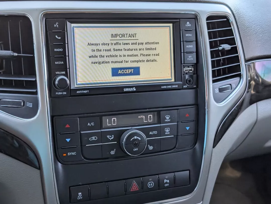 2012 /Dark Graystone/Medium Graystone Jeep Grand Cherokee Laredo Altitude (1C4RJEAG0CC) with an Other engine, located at 804 22nd Ave, Phenix City, AL, 36870, (334) 297-1860, 32.484749, -85.024475 - **Unleash Your Adventurous Spirit with the 2012 Jeep Grand Cherokee Laredo Altitude!**<br /> <br /> Are you looking for the perfect vehicle to elevate your lifestyle? Whether it's weekend getaways, daily commutes, or family road trips, the 2012 Jeep Grand Cherokee Laredo Altitude is designed to meet - Photo#13