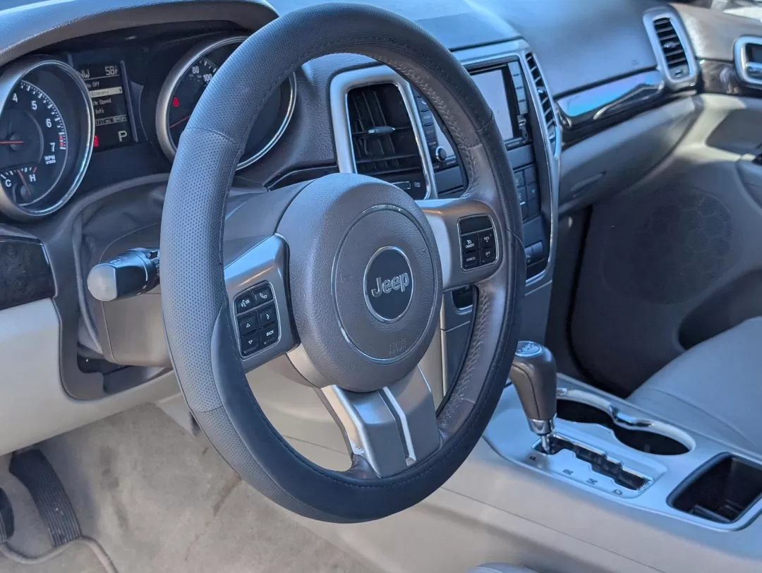 2012 /Dark Graystone/Medium Graystone Jeep Grand Cherokee Laredo Altitude (1C4RJEAG0CC) with an Other engine, located at 1430 Gateway Drive, Opelika, AL, 36801, (334) 239-0944, 32.637871, -85.409790 - **Unleash Your Adventurous Spirit with the 2012 Jeep Grand Cherokee Laredo Altitude!**<br /> <br /> Are you looking for the perfect vehicle to elevate your lifestyle? Whether it's weekend getaways, daily commutes, or family road trips, the 2012 Jeep Grand Cherokee Laredo Altitude is designed to meet - Photo#10