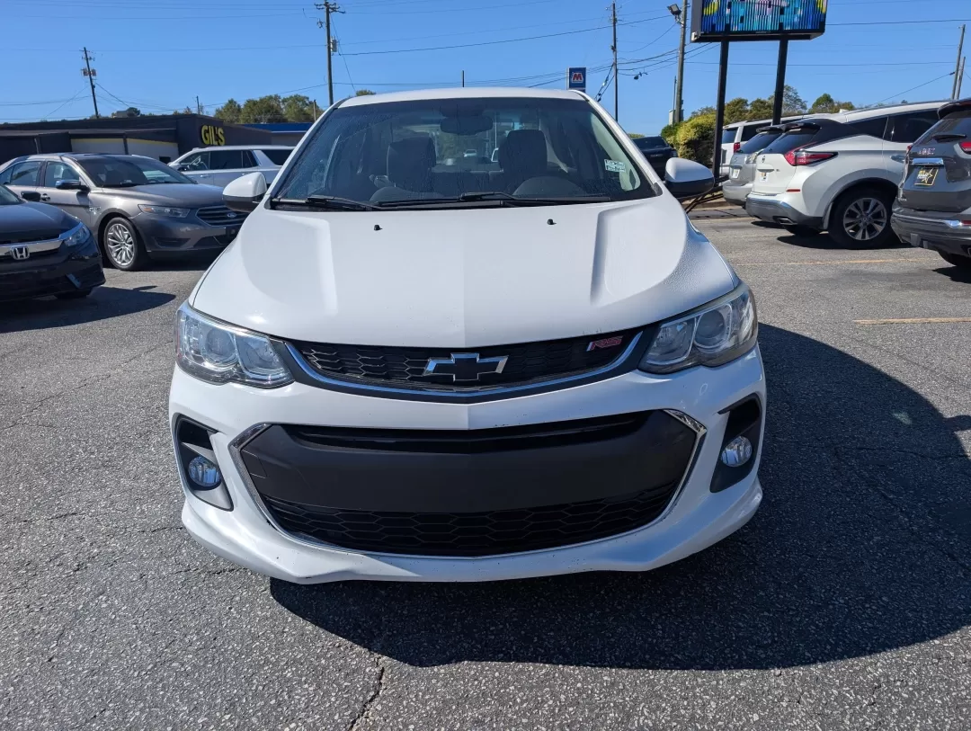 2018 /Jet Black Chevrolet Sonic LT (1G1JD5SHXJ4) with an Other engine, located at 3959 U.S. 80 W, Phenix City, AL, 36870, (334) 297-4885, 32.469296, -85.135185 - **Discover Your Perfect Commute Companion: 2018 Chevrolet Sonic LT at Gils Auto, Phenix City**<br /> <br /> Are you ready to elevate your daily drive? The 2018 Chevrolet Sonic LT is the ideal choice for those who crave a reliable, fuel-efficient sedan that doesn't compromise on style or features. Wh - Photo#1
