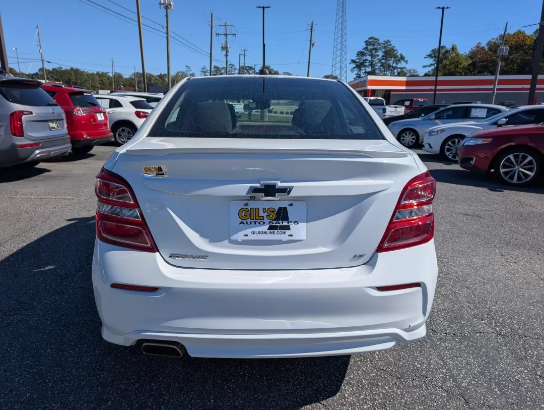 2018 /Jet Black Chevrolet Sonic LT (1G1JD5SHXJ4) with an Other engine, located at 3959 U.S. 80 W, Phenix City, AL, 36870, (334) 297-4885, 32.469296, -85.135185 - **Discover Your Perfect Commute Companion: 2018 Chevrolet Sonic LT at Gils Auto, Phenix City**<br /> <br /> Are you ready to elevate your daily drive? The 2018 Chevrolet Sonic LT is the ideal choice for those who crave a reliable, fuel-efficient sedan that doesn't compromise on style or features. Wh - Photo#5