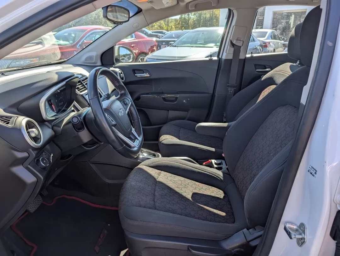 2018 /Jet Black Chevrolet Sonic LT (1G1JD5SHXJ4) with an Other engine, located at 3959 U.S. 80 W, Phenix City, AL, 36870, (334) 297-4885, 32.469296, -85.135185 - **Discover Your Perfect Commute Companion: 2018 Chevrolet Sonic LT at Gils Auto, Phenix City**<br /> <br /> Are you ready to elevate your daily drive? The 2018 Chevrolet Sonic LT is the ideal choice for those who crave a reliable, fuel-efficient sedan that doesn't compromise on style or features. Wh - Photo#9