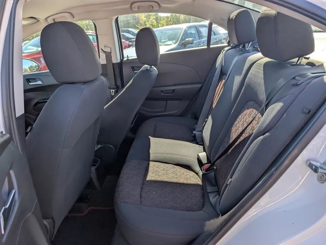 2018 /Jet Black Chevrolet Sonic LT (1G1JD5SHXJ4) with an Other engine, located at 3959 U.S. 80 W, Phenix City, AL, 36870, (334) 297-4885, 32.469296, -85.135185 - **Discover Your Perfect Commute Companion: 2018 Chevrolet Sonic LT at Gils Auto, Phenix City**<br /> <br /> Are you ready to elevate your daily drive? The 2018 Chevrolet Sonic LT is the ideal choice for those who crave a reliable, fuel-efficient sedan that doesn't compromise on style or features. Wh - Photo#10