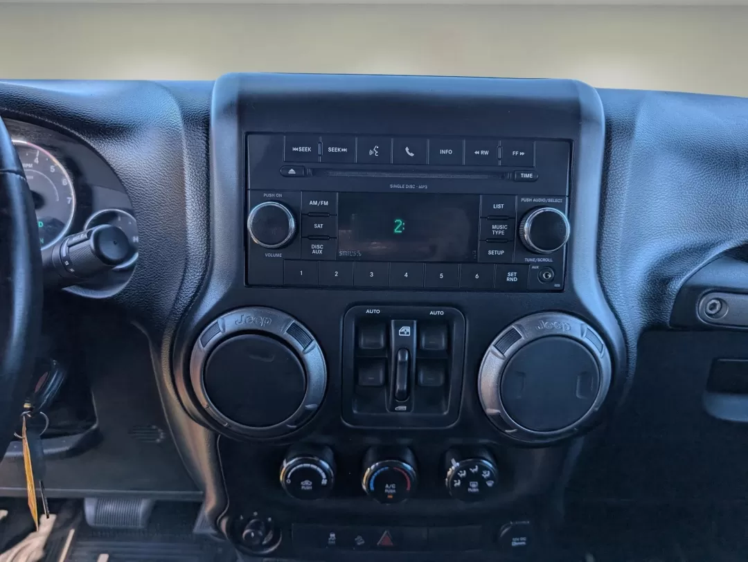 2011 /Black Interior Jeep Wrangler Sport (1J4BA3H10BL) with an Other engine, located at 1430 Gateway Drive, Opelika, AL, 36801, (334) 239-0944, 32.637871, -85.409790 - 2011 Jeep Wrangler Sport - Photo#12