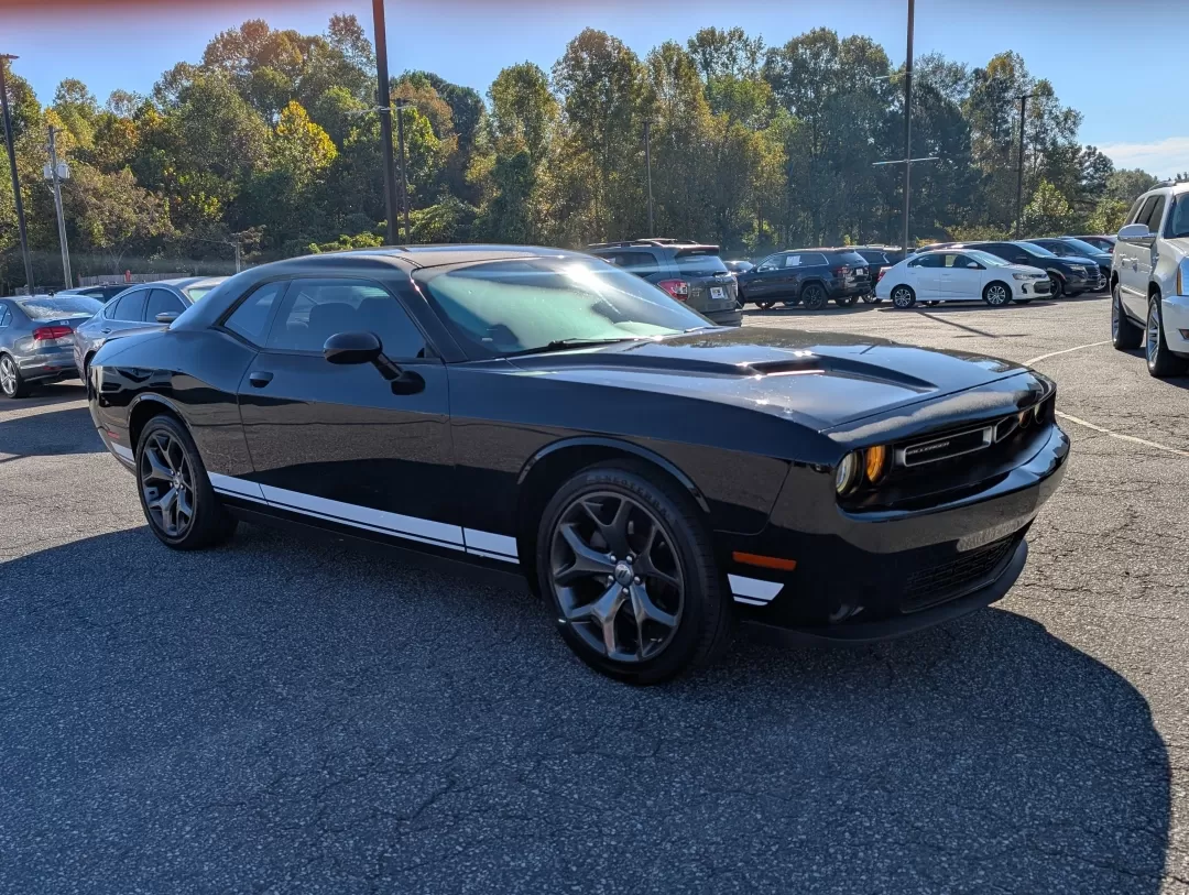2017 /Black Dodge Challenger SXT (2C3CDZAG4HH) with an Other engine, located at 3959 U.S. 80 W, Phenix City, AL, 36870, (334) 297-4885, 32.469296, -85.135185 - Are you ready to elevate your driving experience? Whether you're tearing up the streets or cruising with friends on the weekend, the 2017 Dodge Challenger SXT is designed for those who crave both style and performance. Perfect for anyone looking to make a statement on the road, this coupe combines s - Photo#2