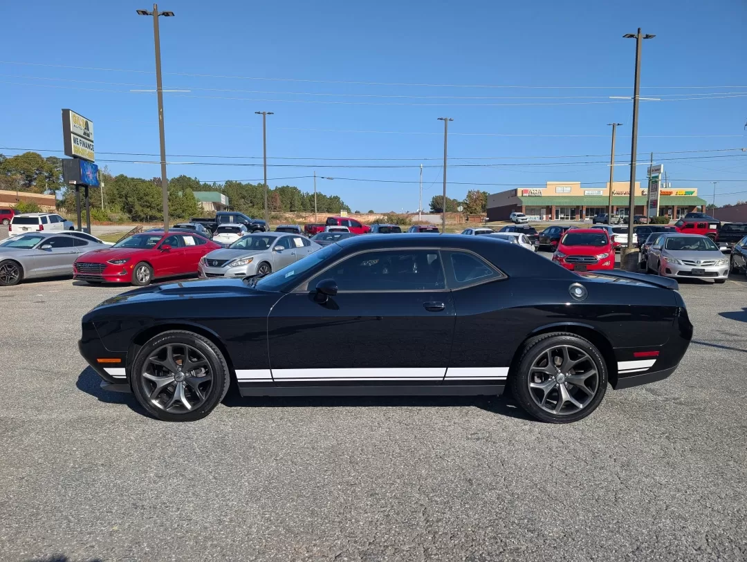 2017 /Black Dodge Challenger SXT (2C3CDZAG4HH) with an Other engine, located at 3959 U.S. 80 W, Phenix City, AL, 36870, (334) 297-4885, 32.469296, -85.135185 - Are you ready to elevate your driving experience? Whether you're tearing up the streets or cruising with friends on the weekend, the 2017 Dodge Challenger SXT is designed for those who crave both style and performance. Perfect for anyone looking to make a statement on the road, this coupe combines s - Photo#7