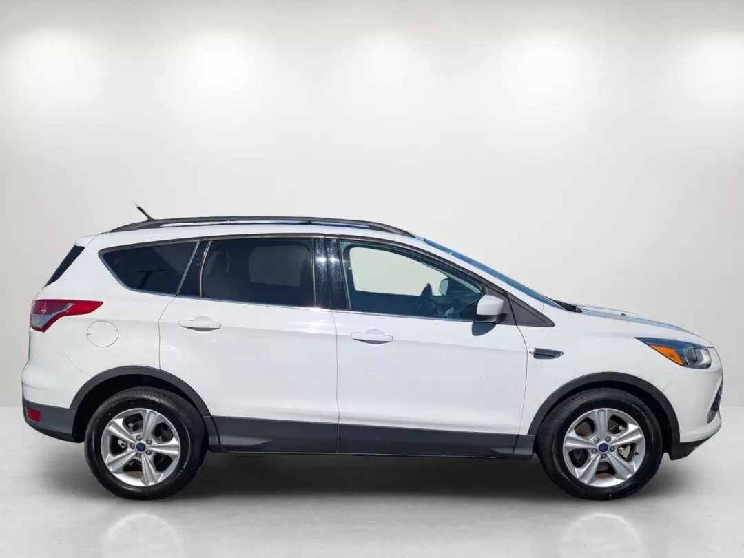 2016 Ford Escape SE (1FMCU0G9XGU) with an Other engine, located at 3959 U.S. 80 W, Phenix City, AL, 36870, (334) 297-4885, 32.469296, -85.135185 - **Discover the Freedom of Adventure with the 2016 Ford Escape SE at Gils Auto - Phenix City!**<br /> <br /> Are you ready to embrace the open road and make lasting memories with your loved ones? Look no further than the 2016 Ford Escape SE, the ideal SUV for growing families and weekend adventurers - Photo#4