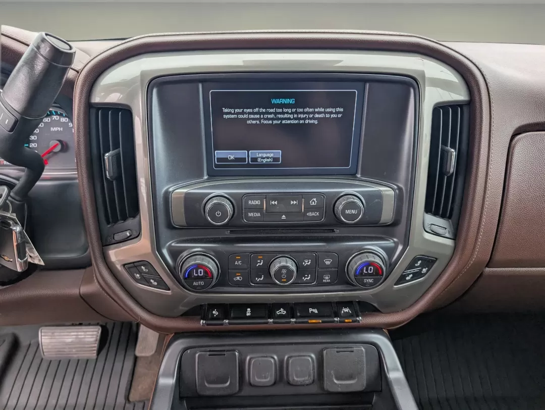 2018 /Saddle Chevrolet Silverado 1500 High Country (3GCUKTECXJG) with an Other engine, located at 3959 U.S. 80 W, Phenix City, AL, 36870, (334) 297-4885, 32.469296, -85.135185 - **Experience Adventure in Style with the 2018 Chevrolet Silverado 1500 High Country at Gils Auto in Phenix City!**<br /> <br /> Are you ready to elevate your driving experience? Whether you're hauling gear for a weekend adventure, commuting to work, or simply running errands around town, the 2018 Ch - Photo#12