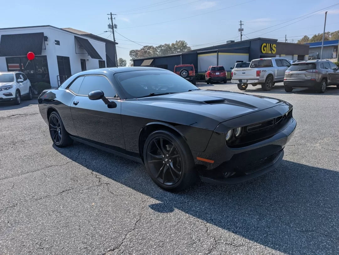 2017 /Black Dodge Challenger SXT (2C3CDZAG5HH) with an Other engine, located at 3959 U.S. 80 W, Phenix City, AL, 36870, (334) 297-4885, 32.469296, -85.135185 - Are you ready to elevate your driving experience and embrace the thrill of the open road? The 2017 Dodge Challenger SXT, available now at Gils Auto in Phenix City, AL, is not just a car; it's a lifestyle choice. Perfect for those who crave performance and style, this coupe is designed for weekend ad - Photo#2