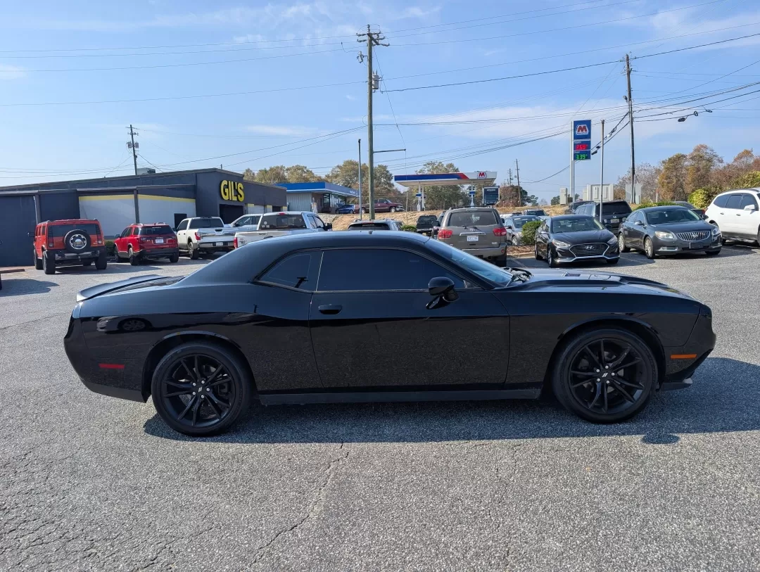2017 /Black Dodge Challenger SXT (2C3CDZAG5HH) with an Other engine, located at 3959 U.S. 80 W, Phenix City, AL, 36870, (334) 297-4885, 32.469296, -85.135185 - Are you ready to elevate your driving experience and embrace the thrill of the open road? The 2017 Dodge Challenger SXT, available now at Gils Auto in Phenix City, AL, is not just a car; it's a lifestyle choice. Perfect for those who crave performance and style, this coupe is designed for weekend ad - Photo#3