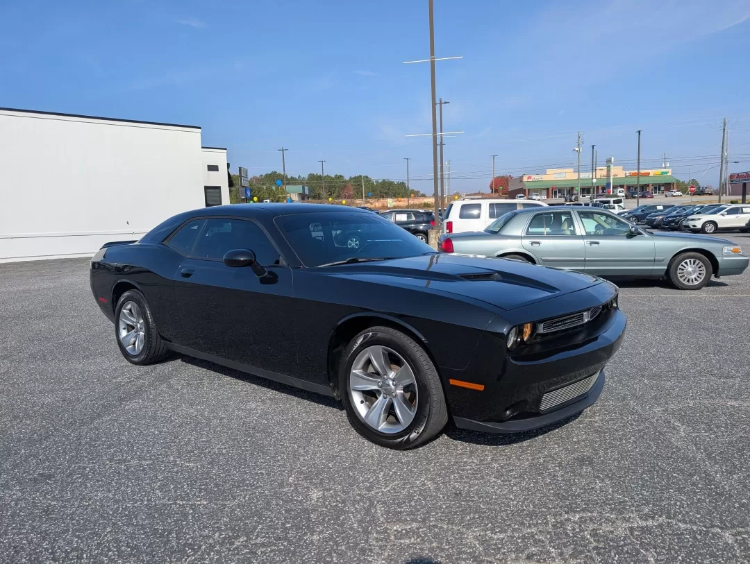 2016 /Black Dodge Challenger SXT (2C3CDZAG5GH) with an Other engine, located at 3959 U.S. 80 W, Phenix City, AL, 36870, (334) 297-4885, 32.469296, -85.135185 - Are you ready to ignite your driving experience? Step into the world of powerful performance and sleek design with our stunning 2016 Dodge Challenger SXT, available now at Gils Auto in Phenix City, AL. This 2-door coupe is not just a vehicle; it's an embodiment of style and muscle, perfect for those - Photo#2