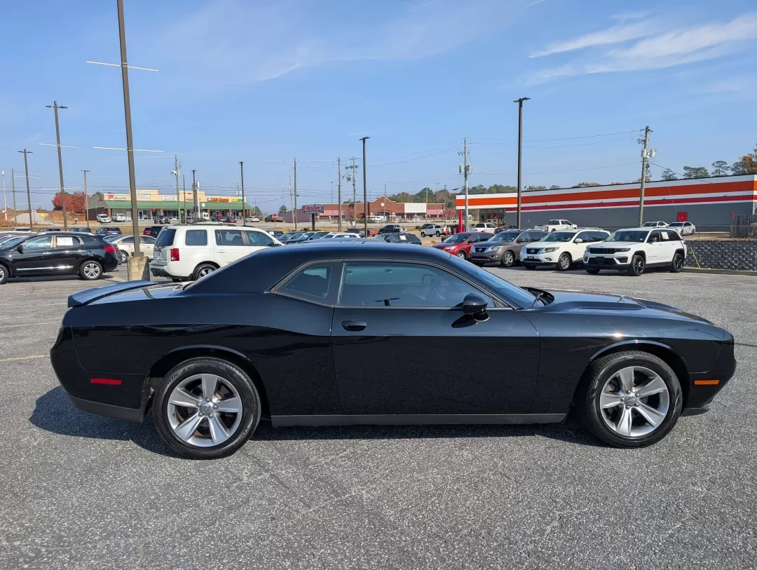 2016 /Black Dodge Challenger SXT (2C3CDZAG5GH) with an Other engine, located at 3959 U.S. 80 W, Phenix City, AL, 36870, (334) 297-4885, 32.469296, -85.135185 - Are you ready to ignite your driving experience? Step into the world of powerful performance and sleek design with our stunning 2016 Dodge Challenger SXT, available now at Gils Auto in Phenix City, AL. This 2-door coupe is not just a vehicle; it's an embodiment of style and muscle, perfect for those - Photo#3