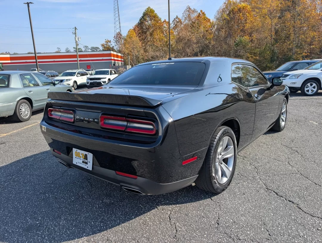 2016 /Black Dodge Challenger SXT (2C3CDZAG5GH) with an Other engine, located at 3959 U.S. 80 W, Phenix City, AL, 36870, (334) 297-4885, 32.469296, -85.135185 - Are you ready to ignite your driving experience? Step into the world of powerful performance and sleek design with our stunning 2016 Dodge Challenger SXT, available now at Gils Auto in Phenix City, AL. This 2-door coupe is not just a vehicle; it's an embodiment of style and muscle, perfect for those - Photo#4