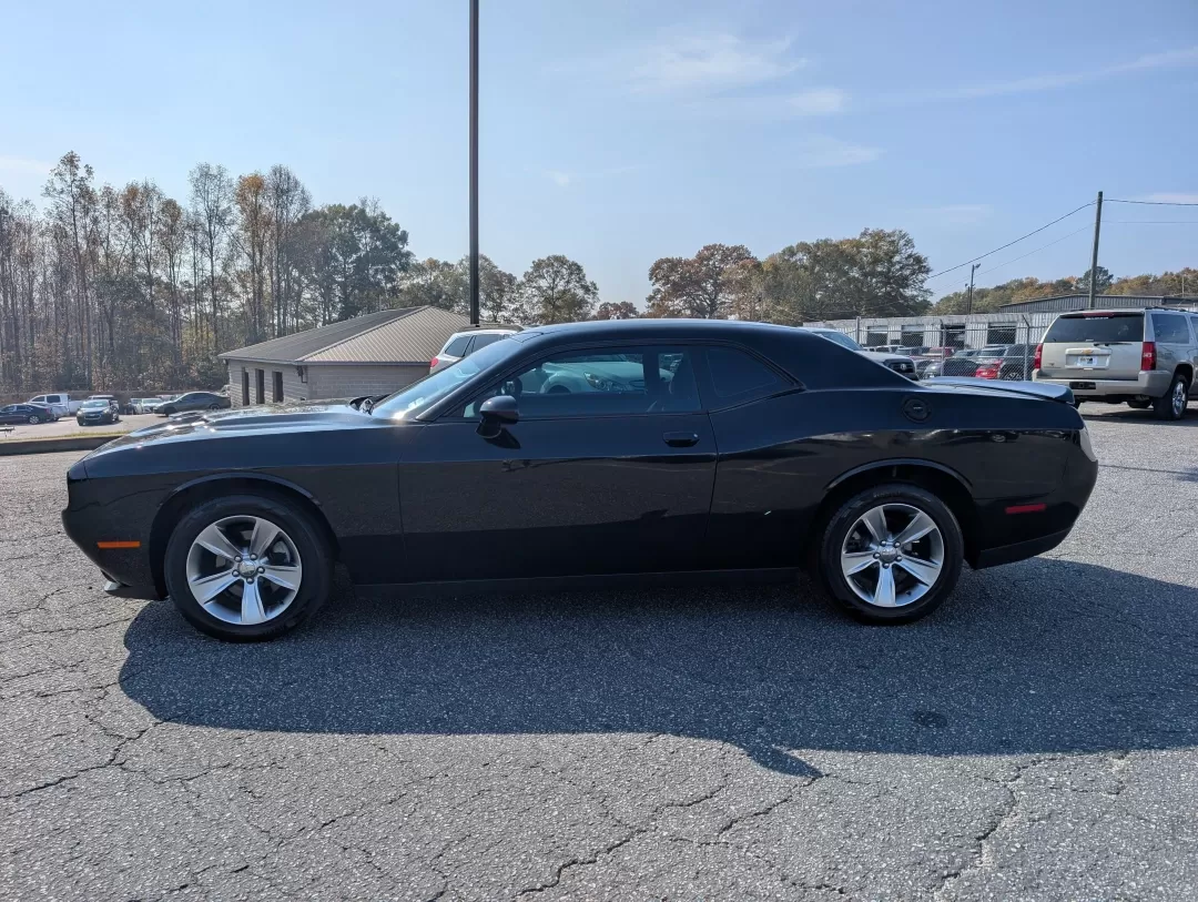 2016 /Black Dodge Challenger SXT (2C3CDZAG5GH) with an Other engine, located at 3959 U.S. 80 W, Phenix City, AL, 36870, (334) 297-4885, 32.469296, -85.135185 - Are you ready to ignite your driving experience? Step into the world of powerful performance and sleek design with our stunning 2016 Dodge Challenger SXT, available now at Gils Auto in Phenix City, AL. This 2-door coupe is not just a vehicle; it's an embodiment of style and muscle, perfect for those - Photo#7