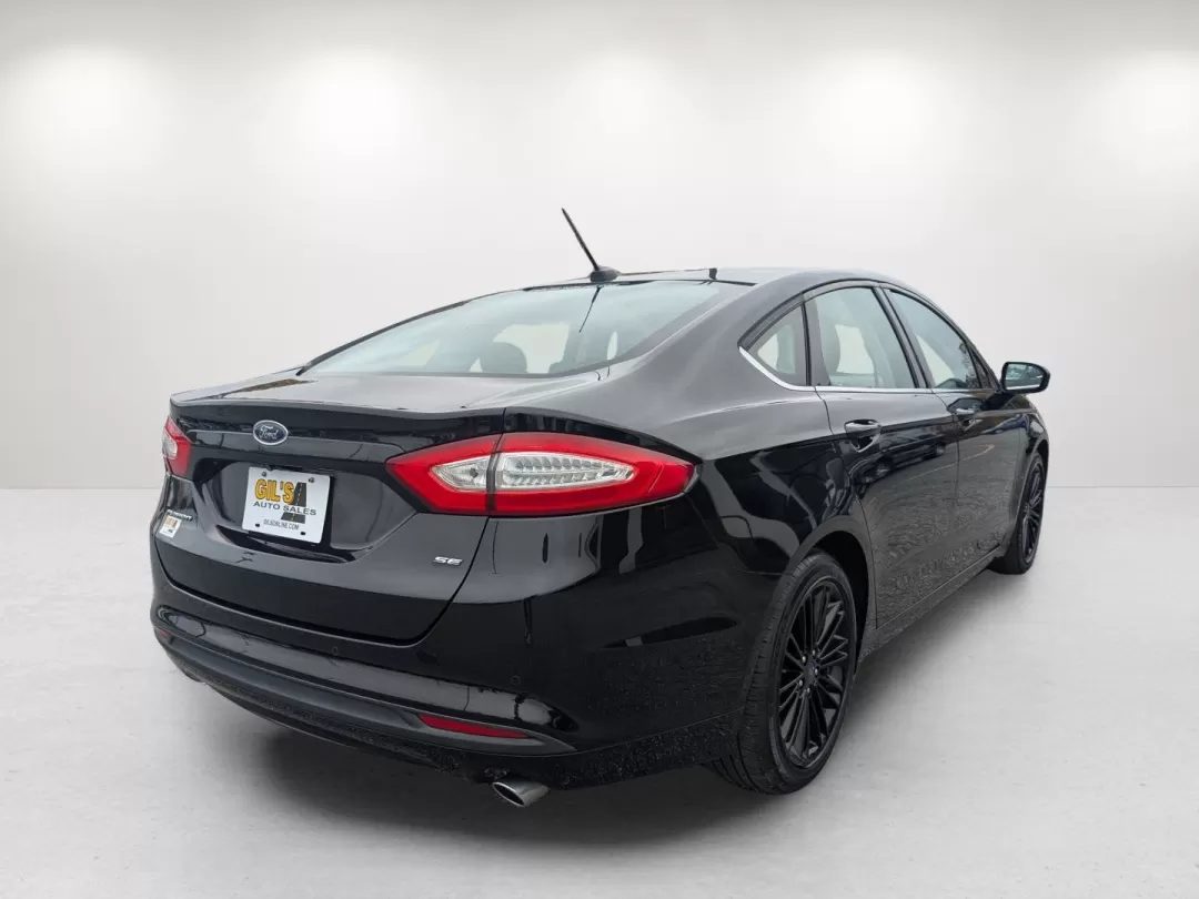 2016 Ford Fusion SE (1FA6P0H75G5) with an Other engine, located at 5115 14th Ave., Columbus, GA, 31904, (706) 323-0345, 32.511494, -84.971046 - **Discover Your Next Adventure with the 2016 Ford Fusion SE at Gils Auto!**<br /> <br /> Are you in search of a versatile sedan that perfectly balances style, comfort, and practicality? Look no further than the 2016 Ford Fusion SE, available now at Gils Auto in Phenix City, AL! This exceptional vehi - Photo#4