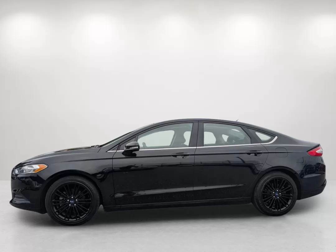 2016 Ford Fusion SE (1FA6P0H75G5) with an Other engine, located at 5115 14th Ave., Columbus, GA, 31904, (706) 323-0345, 32.511494, -84.971046 - **Discover Your Next Adventure with the 2016 Ford Fusion SE at Gils Auto!**<br /> <br /> Are you in search of a versatile sedan that perfectly balances style, comfort, and practicality? Look no further than the 2016 Ford Fusion SE, available now at Gils Auto in Phenix City, AL! This exceptional vehi - Photo#7