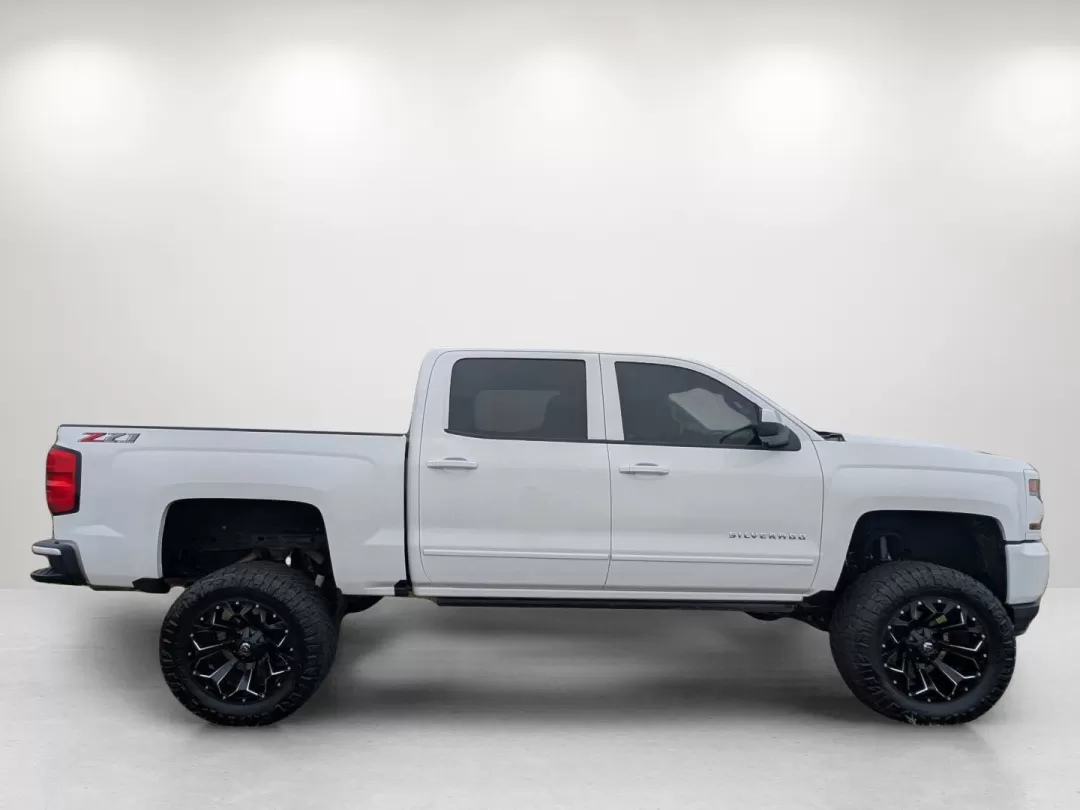 2018 /Jet Black Chevrolet Silverado 1500 LT (3GCUKREC0JG) with an Other engine, located at 3959 U.S. 80 W, Phenix City, AL, 36870, (334) 297-4885, 32.469296, -85.135185 - **Adventure Awaits with the 2018 Chevrolet Silverado 1500 LT** <br /> <br /> Are you ready to elevate your weekend adventures and daily commutes? The 2018 Chevrolet Silverado 1500 LT is not just a truck; it's a lifestyle upgrade. Perfect for those who crave the open road and seek a reliable vehicle - Photo#3