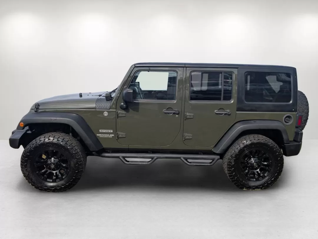 2015 /Black Jeep Wrangler Sport (1C4BJWDG4FL) with an Other engine, located at 3959 U.S. 80 W, Phenix City, AL, 36870, (334) 297-4885, 32.469296, -85.135185 - **Adventure Awaits with the 2015 Jeep Wrangler at Gils Auto - Phenix City!**<br /> <br /> Are you ready to take on the great outdoors, cruise through city streets, or embark on a family road trip? The 2015 Jeep Wrangler Sport is your ultimate companion for adventure, designed to handle any terrain w - Photo#8