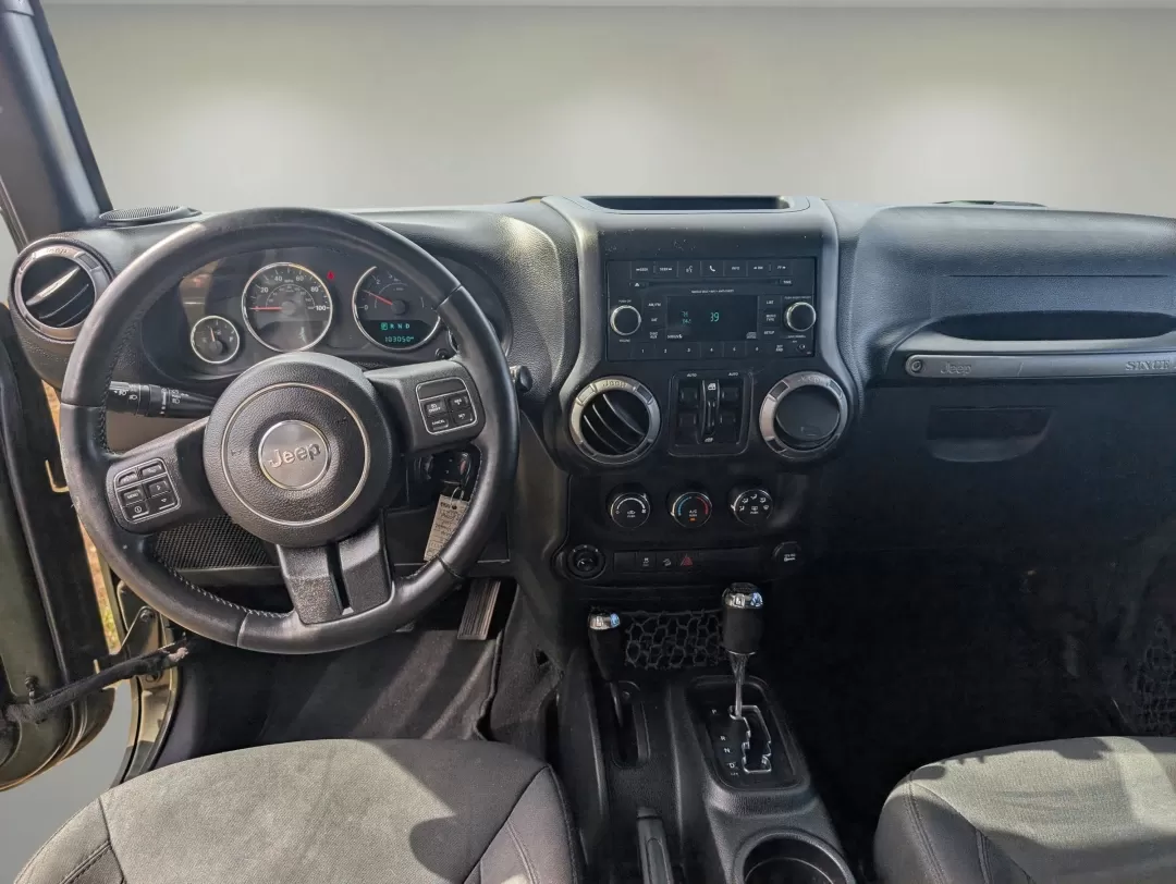 2015 /Black Jeep Wrangler Sport (1C4BJWDG4FL) with an Other engine, located at 3959 U.S. 80 W, Phenix City, AL, 36870, (334) 297-4885, 32.469296, -85.135185 - **Adventure Awaits with the 2015 Jeep Wrangler at Gils Auto - Phenix City!**<br /> <br /> Are you ready to take on the great outdoors, cruise through city streets, or embark on a family road trip? The 2015 Jeep Wrangler Sport is your ultimate companion for adventure, designed to handle any terrain w - Photo#12