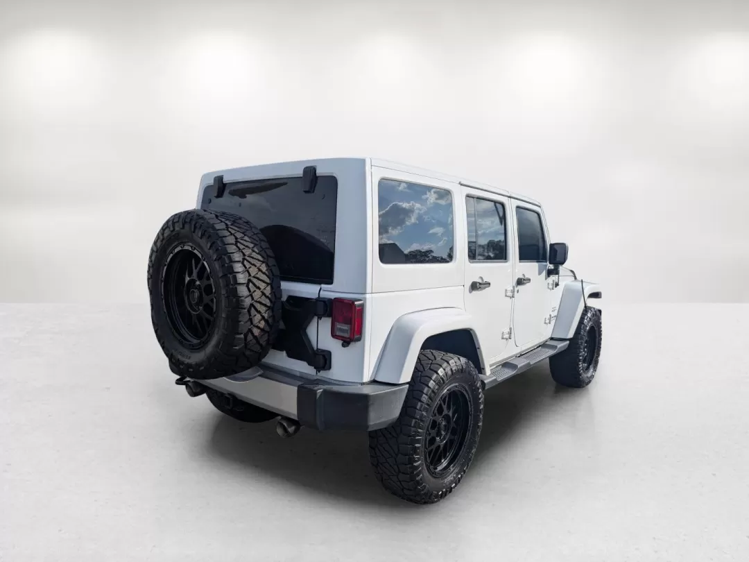 2018 /Black Jeep Wrangler Sahara (1C4BJWEG4JL) with an Other engine, located at 7000 Northlake Connector, Columbus, GA, 31904, (706) 987-8085, 32.524975, -84.978134 - **Adventure Awaits: 2018 Jeep Wrangler Sahara at Gils Auto**<br /> <br /> Are you ready to embark on your next adventure? Whether you're planning a weekend getaway to the stunning landscapes of Lake Martin or navigating through the vibrant streets of Phenix City, this 2018 Jeep Wrangler Sahara is yo - Photo#4