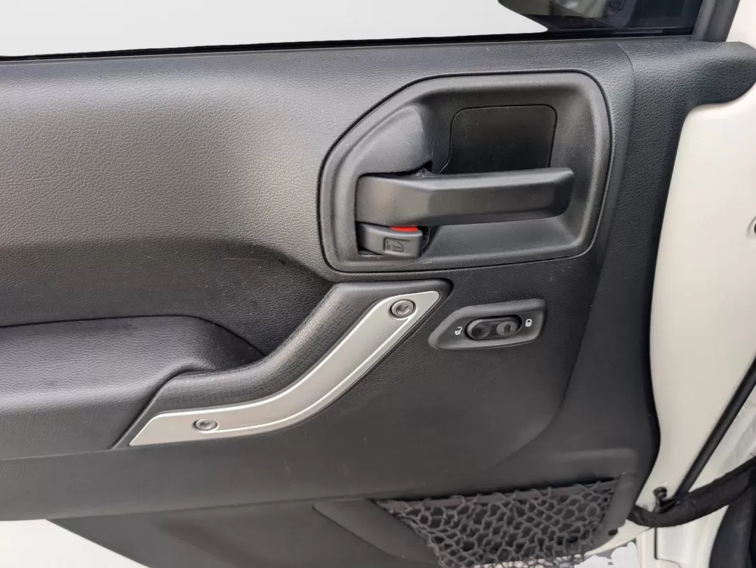 2018 /Black Jeep Wrangler Sahara (1C4BJWEG4JL) with an Other engine, located at 7000 Northlake Connector, Columbus, GA, 31904, (706) 987-8085, 32.524975, -84.978134 - **Adventure Awaits: 2018 Jeep Wrangler Sahara at Gils Auto**<br /> <br /> Are you ready to embark on your next adventure? Whether you're planning a weekend getaway to the stunning landscapes of Lake Martin or navigating through the vibrant streets of Phenix City, this 2018 Jeep Wrangler Sahara is yo - Photo#8