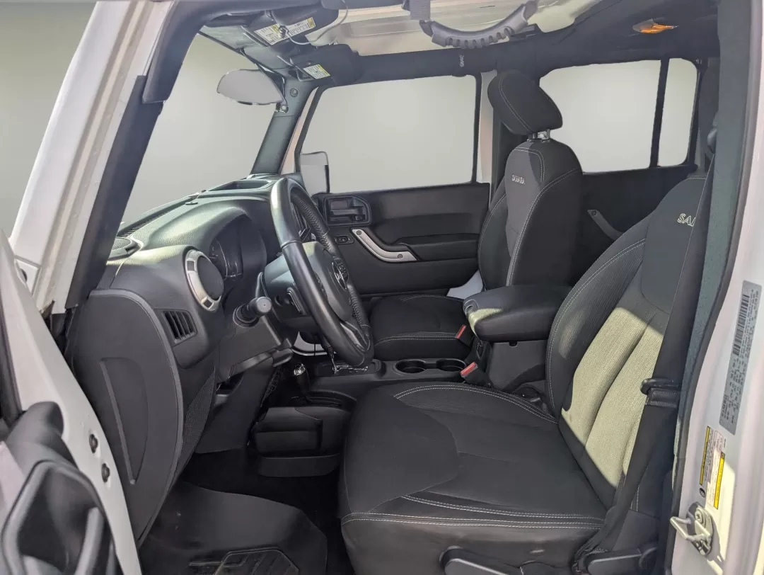 2018 /Black Jeep Wrangler Sahara (1C4BJWEG4JL) with an Other engine, located at 7000 Northlake Connector, Columbus, GA, 31904, (706) 987-8085, 32.524975, -84.978134 - **Adventure Awaits: 2018 Jeep Wrangler Sahara at Gils Auto**<br /> <br /> Are you ready to embark on your next adventure? Whether you're planning a weekend getaway to the stunning landscapes of Lake Martin or navigating through the vibrant streets of Phenix City, this 2018 Jeep Wrangler Sahara is yo - Photo#9