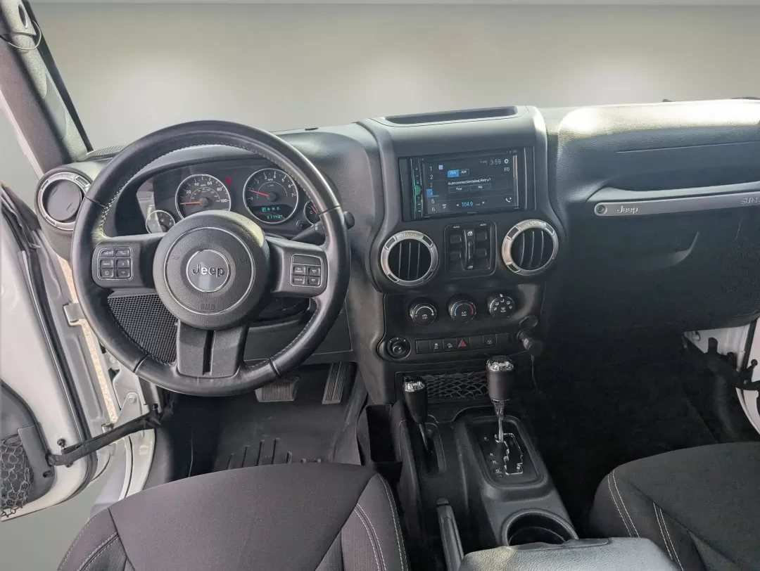 2018 /Black Jeep Wrangler Sahara (1C4BJWEG4JL) with an Other engine, located at 7000 Northlake Connector, Columbus, GA, 31904, (706) 987-8085, 32.524975, -84.978134 - **Adventure Awaits: 2018 Jeep Wrangler Sahara at Gils Auto**<br /> <br /> Are you ready to embark on your next adventure? Whether you're planning a weekend getaway to the stunning landscapes of Lake Martin or navigating through the vibrant streets of Phenix City, this 2018 Jeep Wrangler Sahara is yo - Photo#11