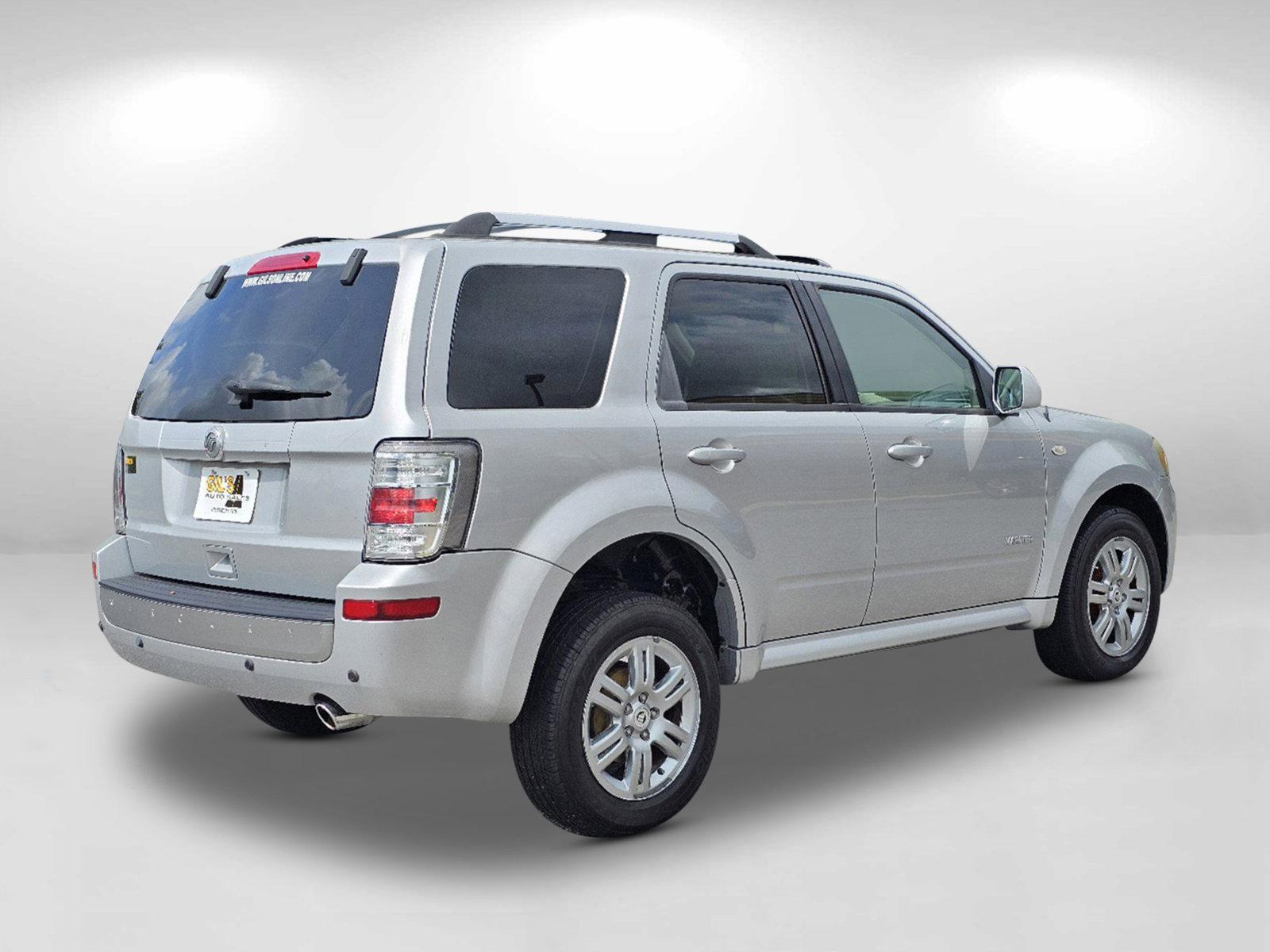 2008 Silver Mercury Mariner Premier (4M2CU87148K) with an Gas V6 3.0L/183 engine, 4-Speed Automatic w/OD transmission, located at 3959 U.S. 80 W, Phenix City, AL, 36870, (334) 297-4885, 32.469296, -85.135185 - 2008 Mercury Mariner Premier - Photo#4