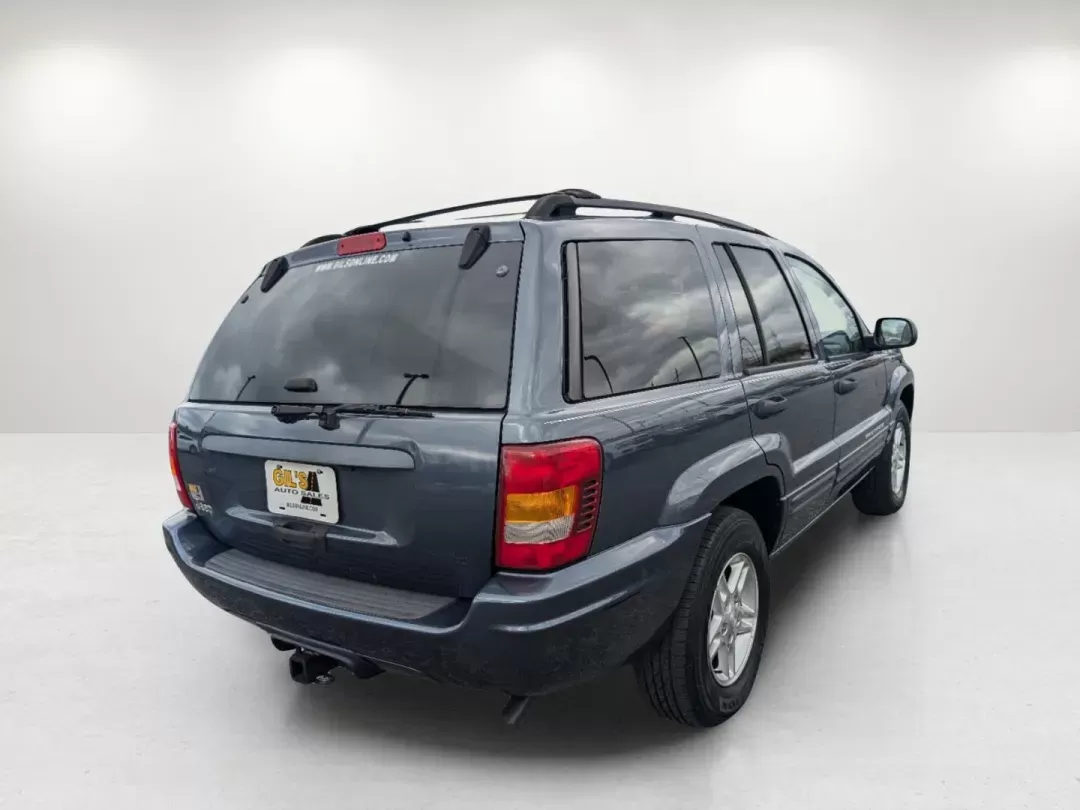 2004 Steel Blue Pearl /Dark Slate Gray Jeep Grand Cherokee Laredo (1J4GX48S34C) with an Gas I6 4.0L/242 engine, 4-Speed Automatic w/OD transmission, located at 521 Old Farm Lane Rd, Prattville, AL, 36066, (334) 325-1505, 32.482460, -86.416367 - 2004 Jeep Grand Cherokee Laredo - Photo#5