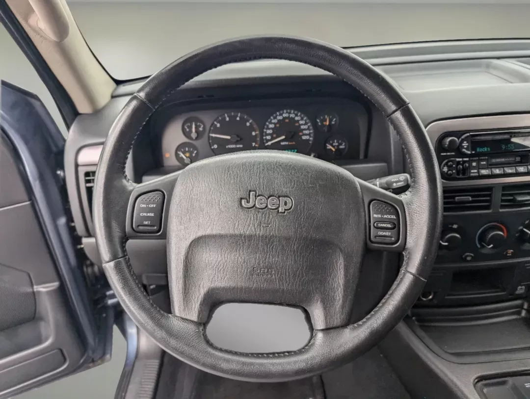 2004 Steel Blue Pearl /Dark Slate Gray Jeep Grand Cherokee Laredo (1J4GX48S34C) with an Gas I6 4.0L/242 engine, 4-Speed Automatic w/OD transmission, located at 521 Old Farm Lane Rd, Prattville, AL, 36066, (334) 325-1505, 32.482460, -86.416367 - 2004 Jeep Grand Cherokee Laredo - Photo#16