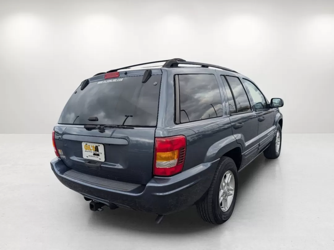 2004 Steel Blue Pearl /Dark Slate Gray Jeep Grand Cherokee Laredo (1J4GX48S34C) with an Other engine, located at 5115 14th Ave., Columbus, GA, 31904, (706) 323-0345, 32.511494, -84.971046 - Explore the great outdoors and embark on unforgettable adventures with the 2004 Jeep Grand Cherokee Laredo, available now at Gils Auto, your trusted Buy Here Pay Here dealership located at 1430 Gateway Drive, Opelika, AL 36801. This sport utility vehicle is the perfect companion for those who crave - Photo#4