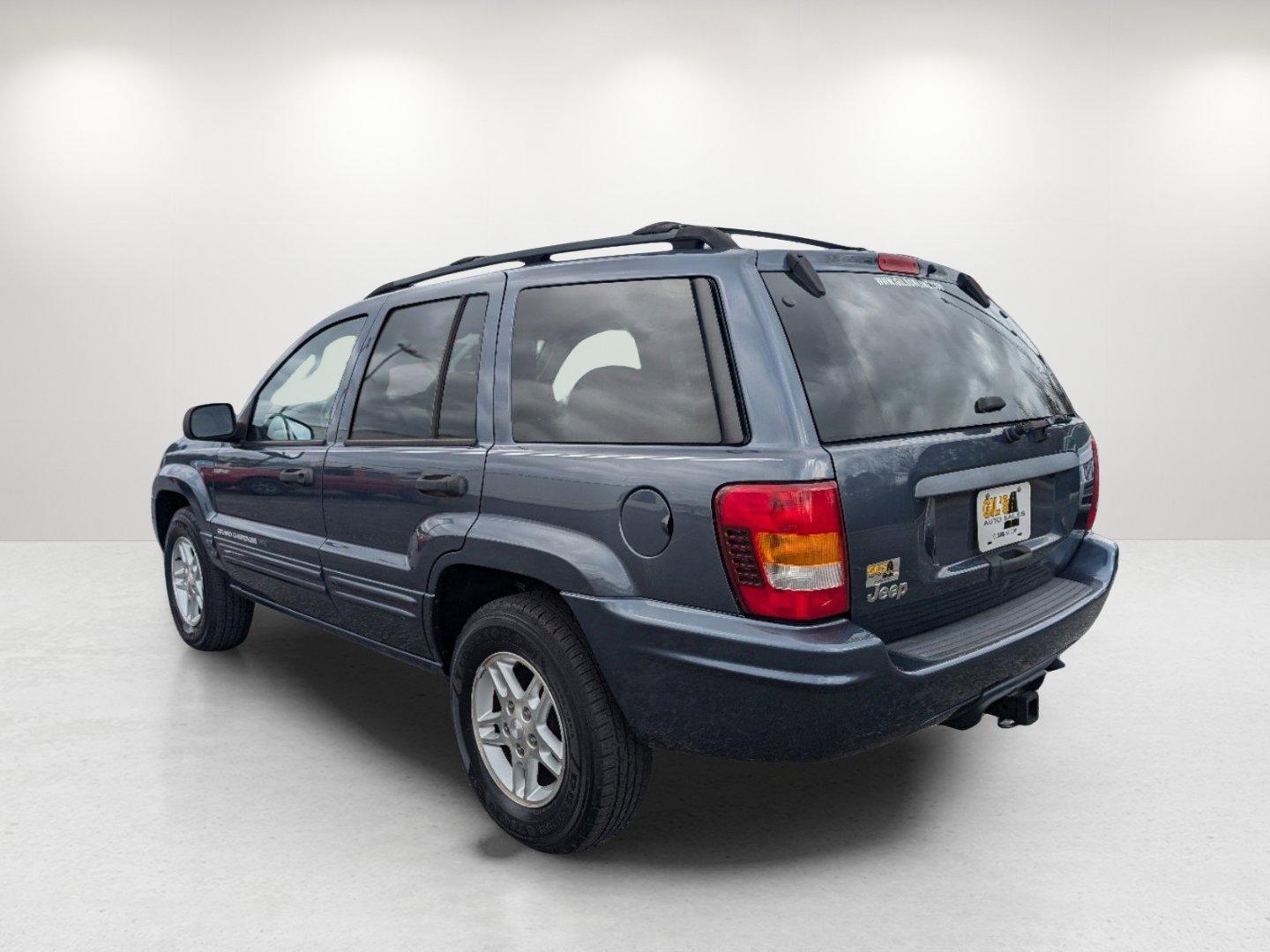 2004 Steel Blue Pearl /Dark Slate Gray Jeep Grand Cherokee Laredo (1J4GX48S34C) with an Gas I6 4.0L/242 engine, 4-Speed Automatic w/OD transmission, located at 1430 Gateway Drive, Opelika, AL, 36801, (334) 239-0944, 32.637871, -85.409790 - 2004 Jeep Grand Cherokee Laredo - Photo#6