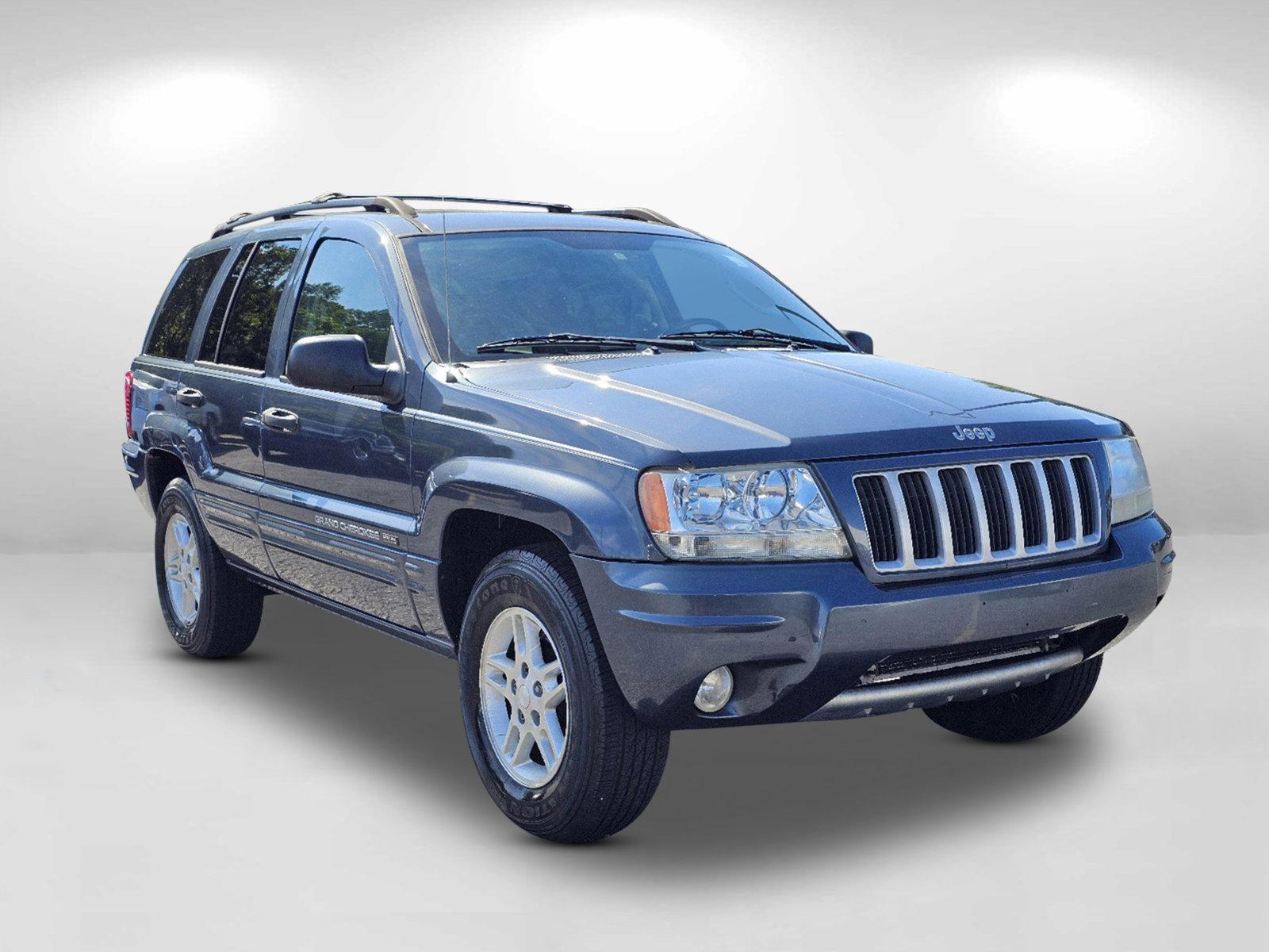 2004 Steel Blue Pearl /Dark Slate Gray Jeep Grand Cherokee Laredo (1J4GX48S34C) with an Gas I6 4.0L/242 engine, 4-Speed Automatic w/OD transmission, located at 804 22nd Ave, Phenix City, AL, 36870, (334) 297-1860, 32.484749, -85.024475 - 2004 Jeep Grand Cherokee Laredo - Photo#2