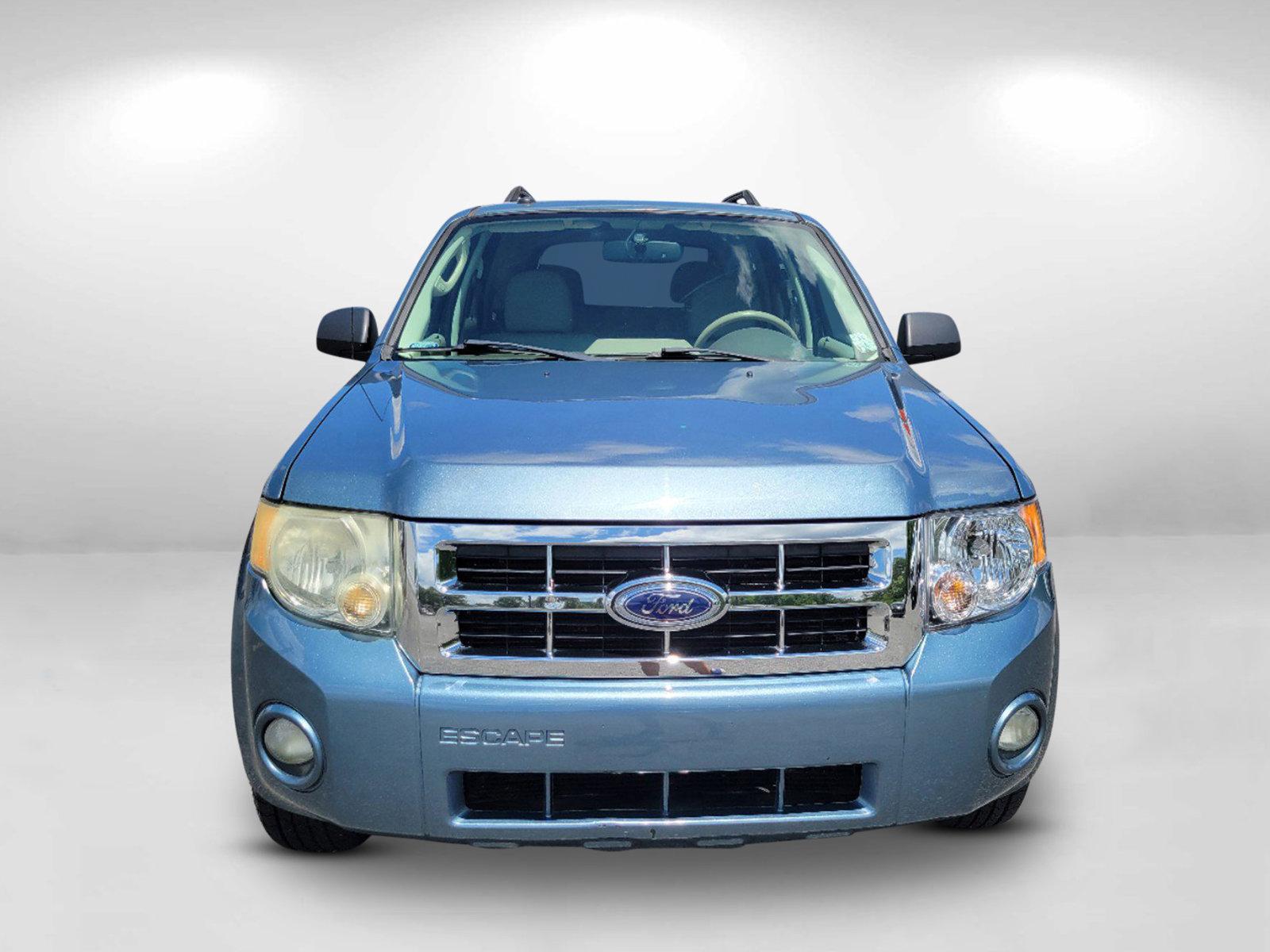 2011 Blue Ford Escape XLT (1FMCU0D73BK) with an Gas I4 2.5L/152 engine, 6-Speed Automatic transmission, located at 5115 14th Ave., Columbus, GA, 31904, (706) 323-0345, 32.511494, -84.971046 - 2011 Ford Escape XLT - Photo#2