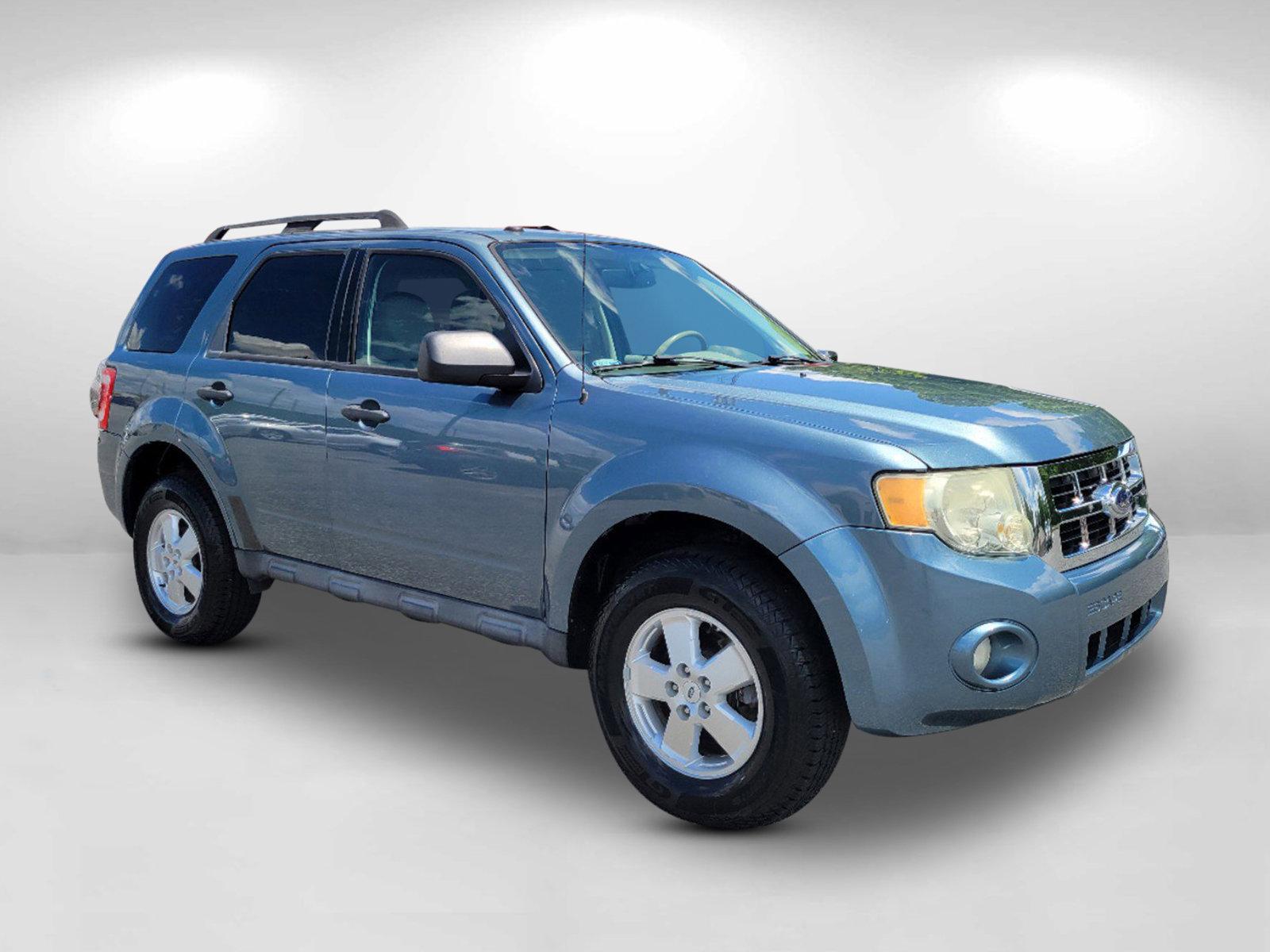 2011 Blue Ford Escape XLT (1FMCU0D73BK) with an Gas I4 2.5L/152 engine, 6-Speed Automatic transmission, located at 5115 14th Ave., Columbus, GA, 31904, (706) 323-0345, 32.511494, -84.971046 - 2011 Ford Escape XLT - Photo#4